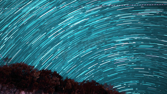 宇宙摄影照片_夏日夜晚繁星轨迹摄影图