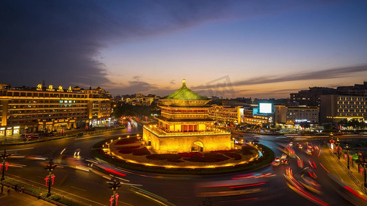 杭州旅游海报摄影照片_陕西西安地标旅游景点钟楼火烧云日落日转夜车水马龙