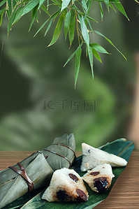 端午素材背景图片_端午节粽子绿色写实海报