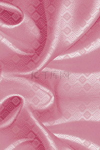中国风花朵粉色绸缎纹理背景