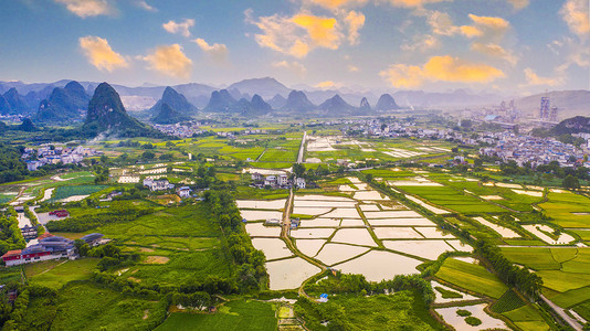 夕阳远帆摄影照片_夕阳广西柳州小镇日落风光田园摄影图配图