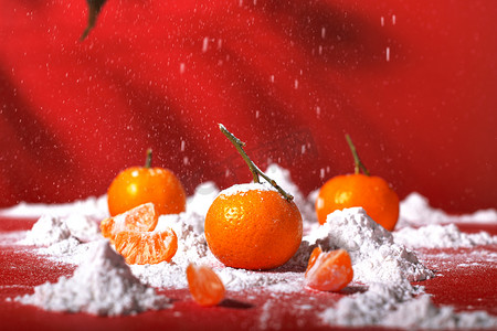 中国黄色摄影照片_静物棚拍橘子24节气小雪小雪摄影图配图