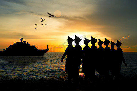 夕阳创意摄影照片_建军节夕阳海军军舰海边创意合成摄影图配图