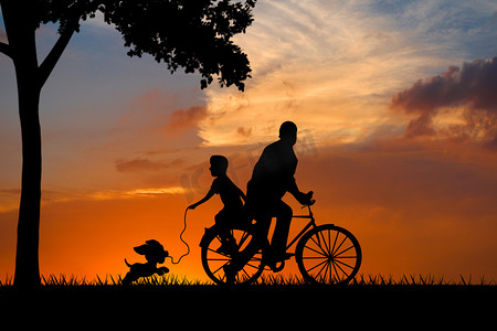 爸爸节日摄影照片_亲子夕阳骑车的父子大树下剪影摄影图配图