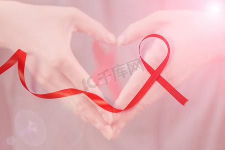 世界艾滋病日红丝带摄影图关爱世界艾滋日合成丝带爱心关心公益