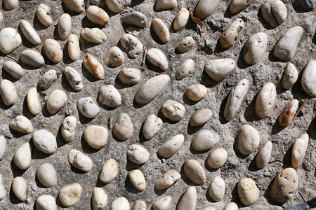 质感石子路面纹理鹅卵石石材路面摄影图配图