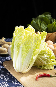 蔬菜馒头摄影照片_蔬菜早上白菜桌上摆放摄影图配图
