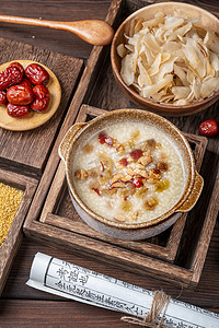 养胃摄影照片_养胃小米粥与红枣百合干食材摄影图配图