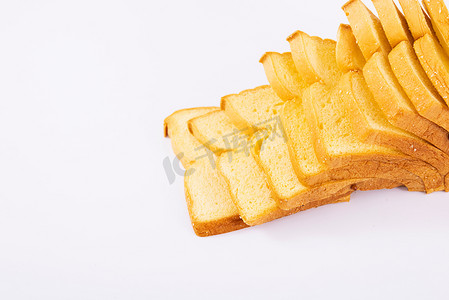面包片全麦面包创意白色背景摄影图配图