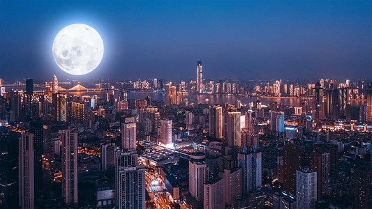 城市夜景圆月中秋节夜晚月亮城市中秋节赏月摄影图配图