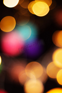 紫色动感光效摄影照片_彩色光斑夜晚光斑室内光效摄影图配图