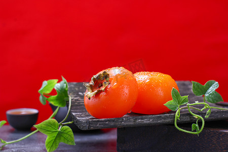水果秋柿子千禧年创意蔬果图摄影图配图