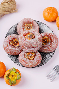 香甜摄影照片_秋季饮食营养香甜柿子饼摄影图配图