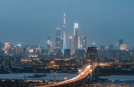 地标性建筑广州小蛮腰摄影照片_广州新光桥夜景晚上建筑城市摄影图配图