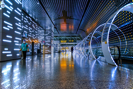 广州广州机场飞机场候客大厅出行通道摄影图配图