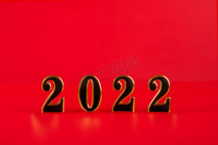 春节新春数字2022红色背景摆放摄影图配图