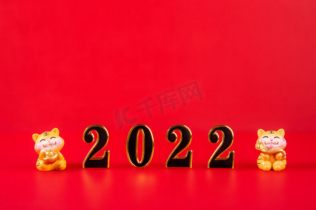 元旦红色喜庆背景摄影照片_新年春节2022红色背景过年摄影图配图