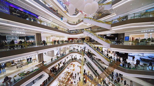 购物节海报摄影照片_城市大型购物商场室内人流