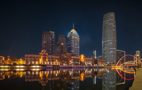 写字楼夜景摄影照片_天津海河城市建筑cbd夜景摄影图配图