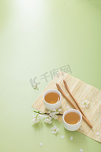 清新海报摄影照片_文艺茶白天放在茶席上的茶杯室内无摄影图配图