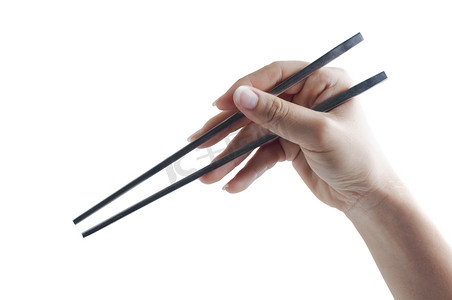 拿筷子的手势特写餐具