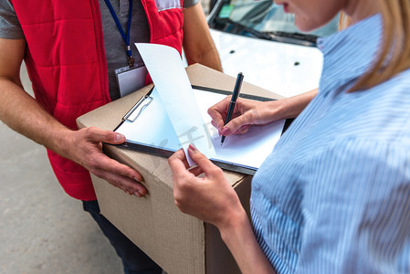 Concept of courier delivers package for woman