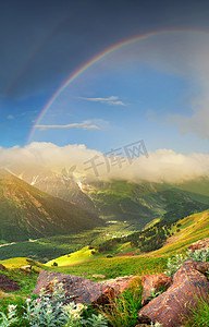 天气摄影照片_彩虹在山脊