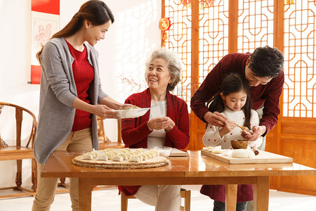 饺子图片摄影照片_幸福家庭过年包饺子