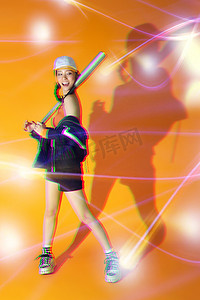 酷炫梦幻背景摄影照片_年轻女孩打棒球