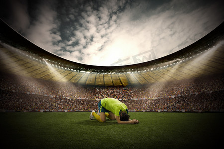 世界杯摄影照片_球场上一名伤心的运动员