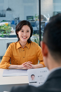 职业女人摄影照片_青年女人参加工作面试