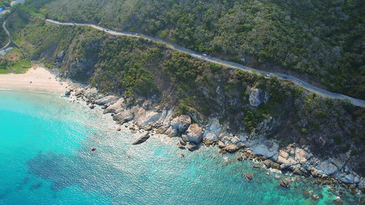 航拍三亚湛蓝海水盘山公路