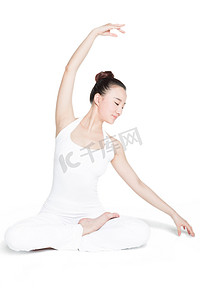 yoga摄影照片_在练习瑜伽的运动型女人