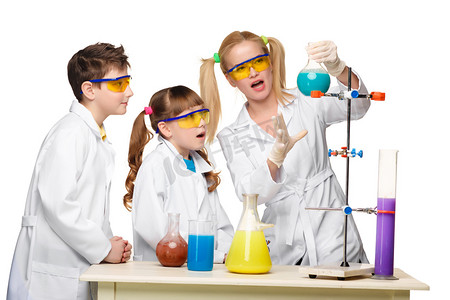 青少年和老师的化学课做实验教师节
