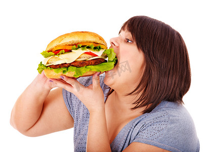 hamburguer摄影照片_女人吃汉堡.