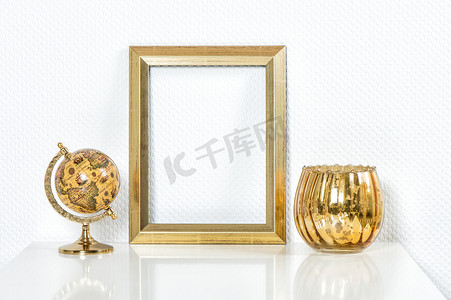 photo摄影照片_Golden picture frame with decorations. Mock up for your photo