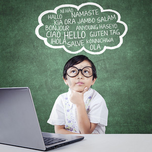 Pensive student with laptop learn multi language