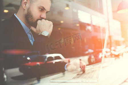 Man proud CEO reading on laptop 