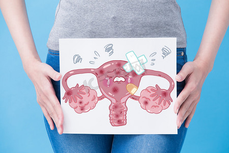 健康的摄影照片_妇女采取不健康的子宫广告牌在蓝色背景