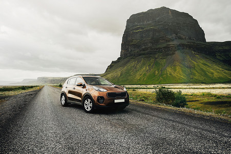 SUV car. Travel concept with big 4x4 sport and modern car in mountains. Iceland. Beautiful landscape in Iceland.
