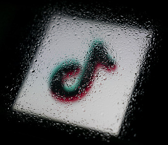 Music note.Abstract photo with drops of water.