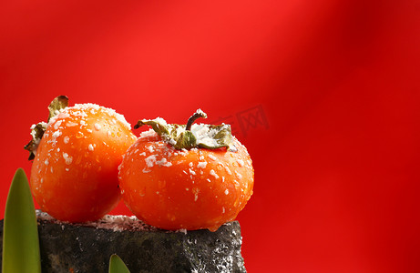 红色野菊摄影照片_霜降棚拍柿子24节气红色摄影图配图
