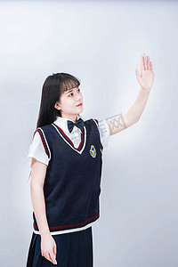 JK制服上午女孩室内手势动作摄影图配图