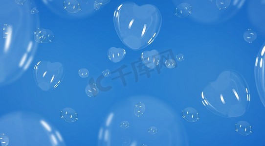 冷泡摄影照片_蓝色背景上的心形肥皂泡