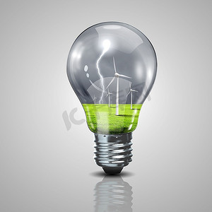 电灯泡和风在里面弥漫着绿色能源的象征
