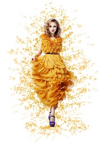 优雅优雅闪亮的女人，穿着时髦的现代黄色春装