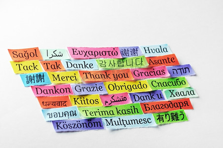 cloud摄影照片_谢谢Word Cloud打印在不同语言的彩色纸上