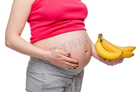 成熟的香蕉在掌中的孕妇没有发照片的
