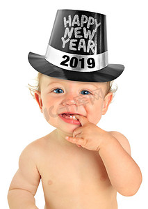 2019年除夕摄影照片_可爱的十月大的小男孩戴着一个快乐的新年帽子。2019