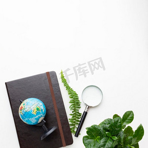装饰图框摄影照片_带植物笔记本的顶视图框